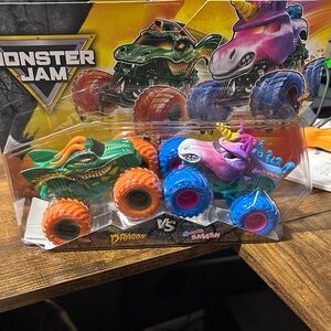 Dragon vs. Sparkle Smash Toy Trucks